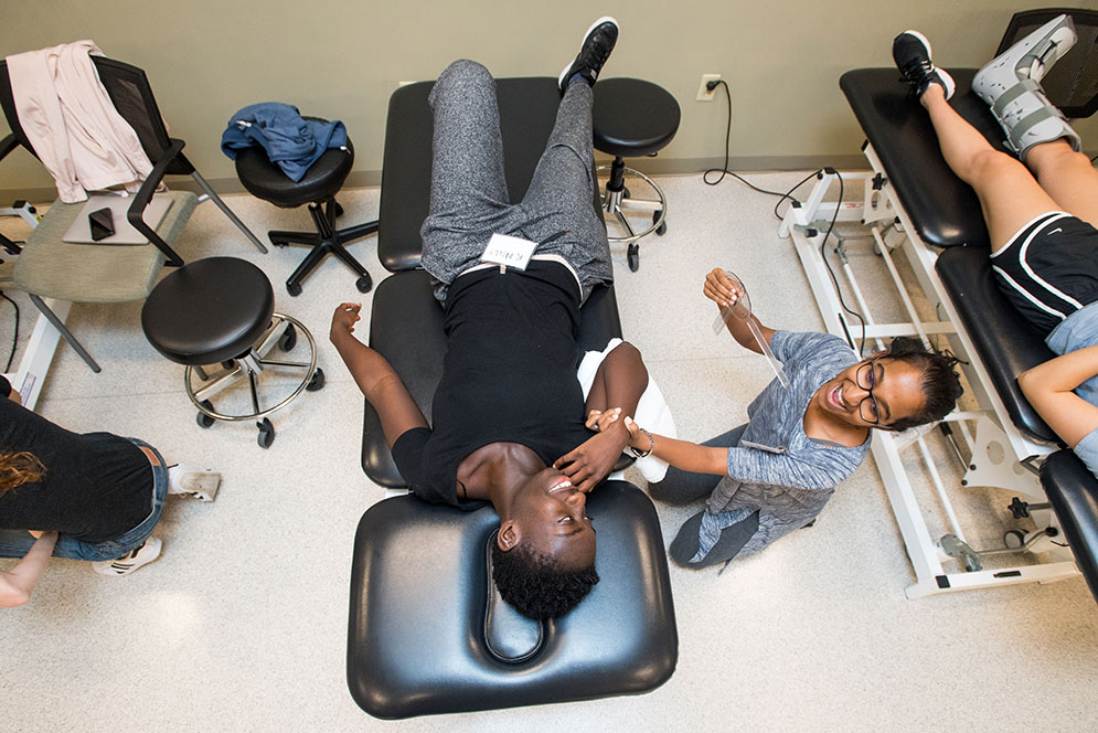 A bird’s-eye view lends an interesting perspective on a Sargent College physical therapy class, as Varshini Balasubramanian (Sargent’20) does a range-of-motion assessment on the elbow of her patient, Arnelle Kodjo (Sargent’20)