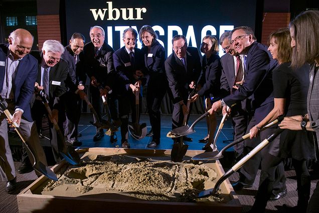 Lead funders for WBUR’s CitySpace dig their shovels into a pit of sand during the ground breaking ceremony and celebration of the upcoming, state-of-the-art multimedia venue.