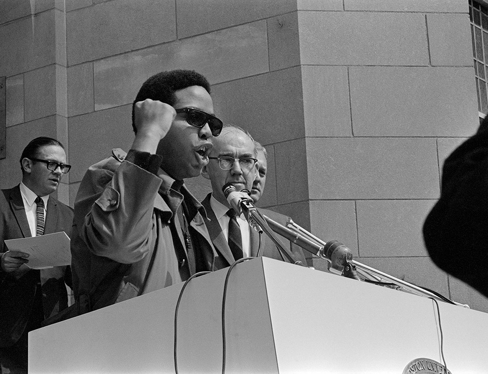 Ed Coaxum speaks at a memorial service on for Martin Luther King, Jr. the day after he was assassinated, Marsh Plaza, Boston University, 1968