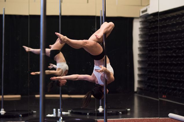 Liz Roncka teaches a pole dancing class