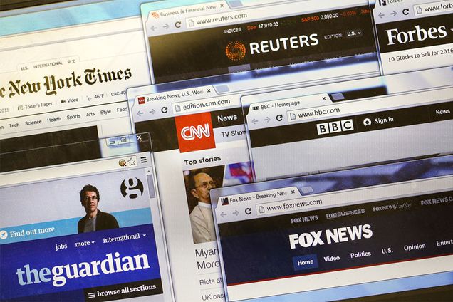 Composite image showing several open browswer windows displaying news websites such as New York Times, CNN, and The Guardian