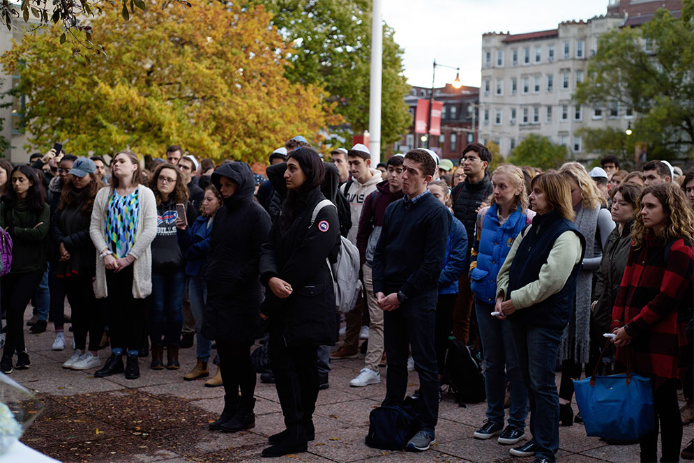 Boston University students and faculty listen to speakers at the vigil held for the victims of the Tree of Life Synagogue shootings at Marsh Plaza.