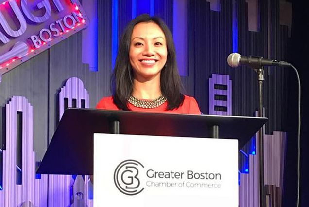 Monica L. Wang, assistant professor of community health sciences at the Boston University School of Public Health smiles for a photo as she receives an Outstanding Young Leaders award from the Greater Boston Chamber of Boston