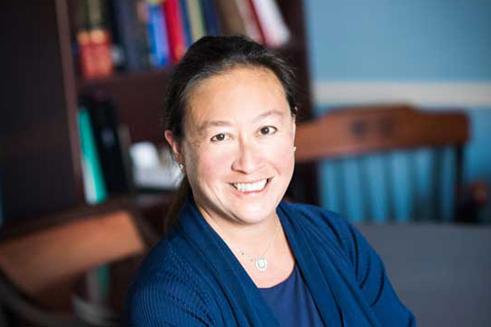 Portrait of Jennifer Tseng, Boston Medical Center’s surgeon-in-chief, sitting chair in her office