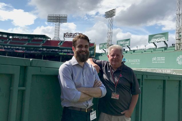 Chris Stokum (GRS’21) (left) and Red Sox team historian Gordon Edes at Fenway Park