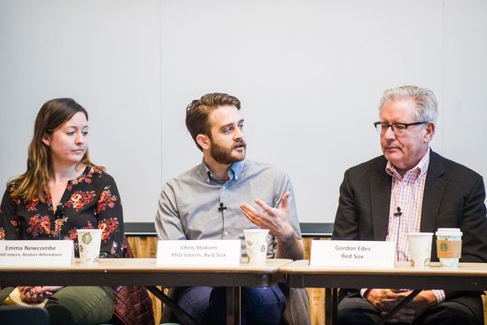 Students speak on a panel about their internships.