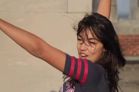 Video still of US congresswoman Alexandria Ocasio-Cortez dancing in a video filmed while she was in college at Boston University