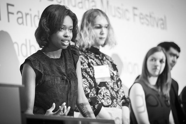 BU entrepreneurs Ellice Patterson, Dielle Lundberg, and Ines Andrade answer questions at the podium during the IDEA 2019 conference.