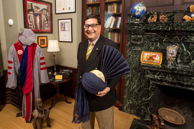 Adil Najam, Pardee School Dean, stands in his office