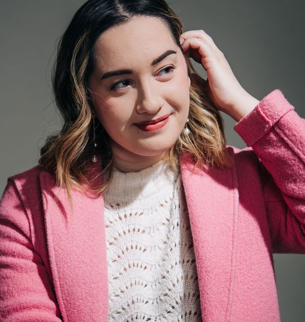 Natalie Held (CAS’21) poses in a pink coat from J-Crew