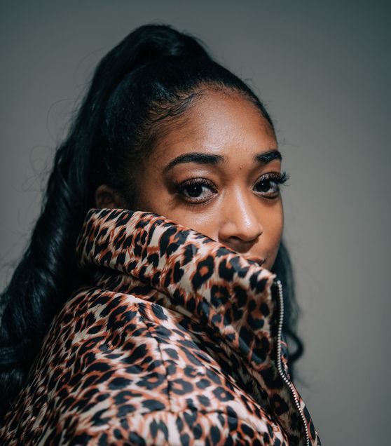 Kelsey Russell (CAS’22) peers over the collar of her cheetah print jacket