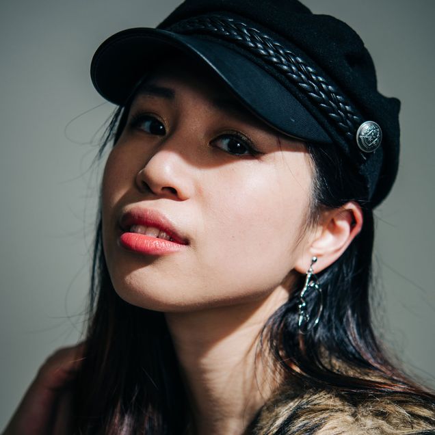 Ashley Erica Wong (LAW’21) poses wearing a black Brixton cap, her favorite fall accessory