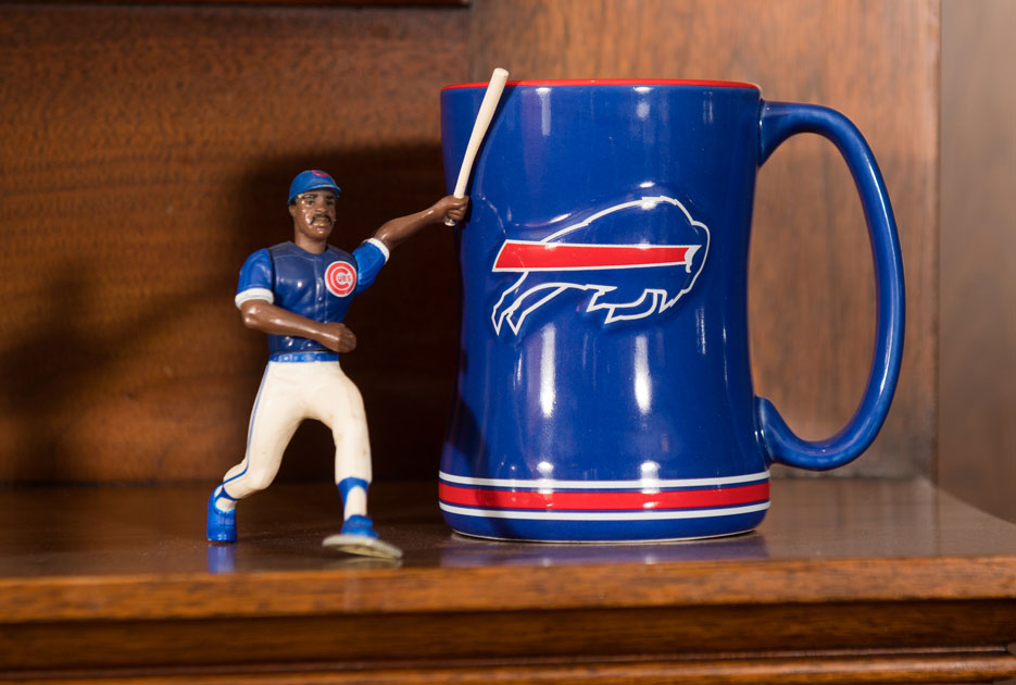 Chicago Cubs action figure and Buffalo Bills mug