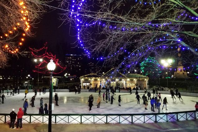 People skate on the Boston Frog Pond at Nighttime