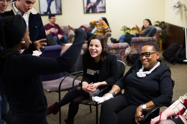 Laura Rose Montorio and Katherine Kennedy of the Boston University Howard Thurman Center chat with a student during the grand closing ceremony for the Center's location at the George Sherman Union.