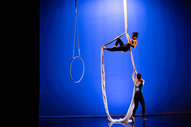 Joanna Chiu (ENG'20) and Jessica Tin, a researcher at Sargent College perform a lyra and silk duo during an aerial dance