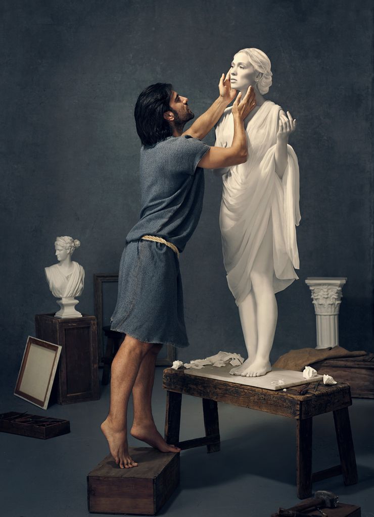 A photo of a sculptor working on a statue as part of Elizabeth Caren's Pygmalion and Galatea series.