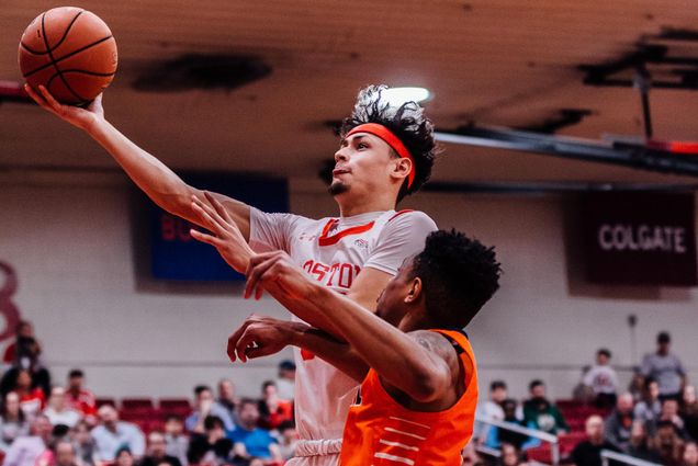 A photo of Javante McCoy shooting the ball.
