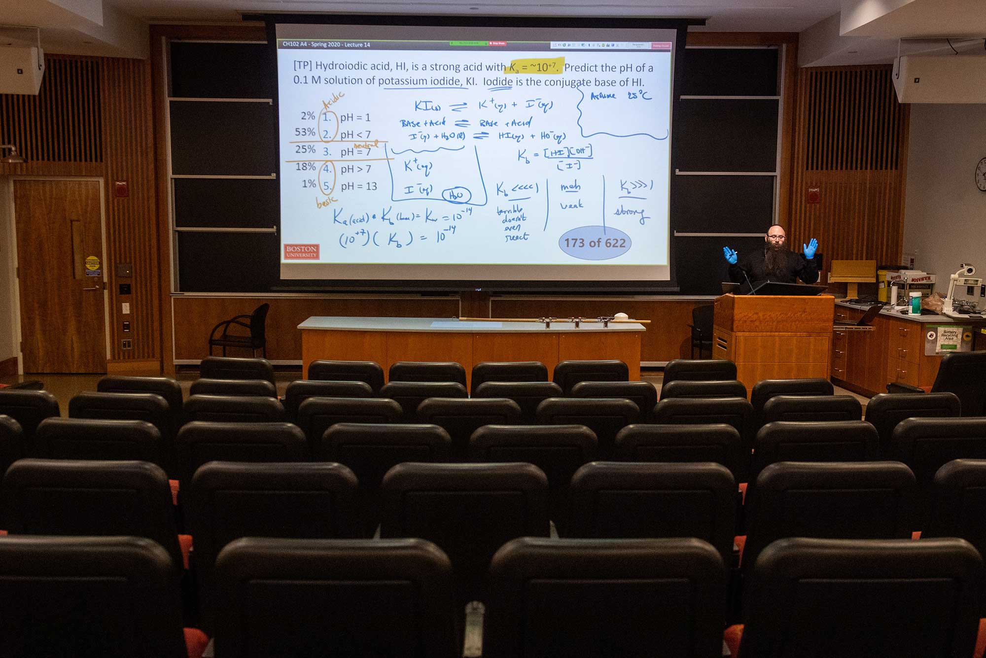 Senior Lecturer in Chemistry Binyomin Abrams gives a remote lecture using a laptop and his smart-podium at Boston University.