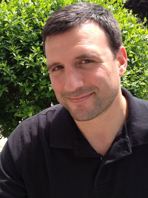 Portrait of Seth Blumenthal, a College of Arts & Sciences senior lecturer in the writing program, and the recipient of a Metcalf Award for Excellence in Teaching.