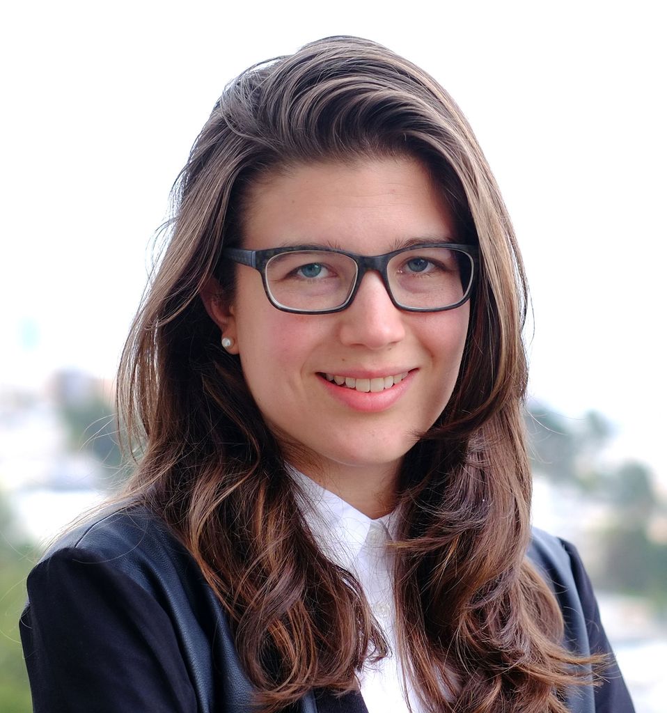 Portrait of Emma Lejeune, College of Engineering assistant professor of mechanical engineering, in a blue blazer.