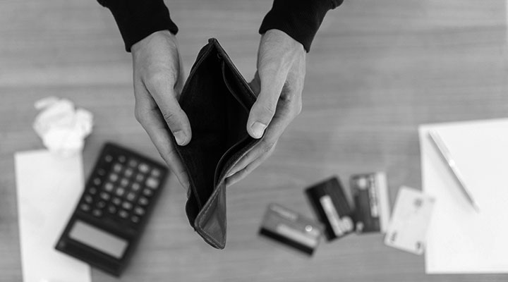 A photo of someone with their wallet out