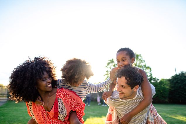 A photo of a family having fun outside
