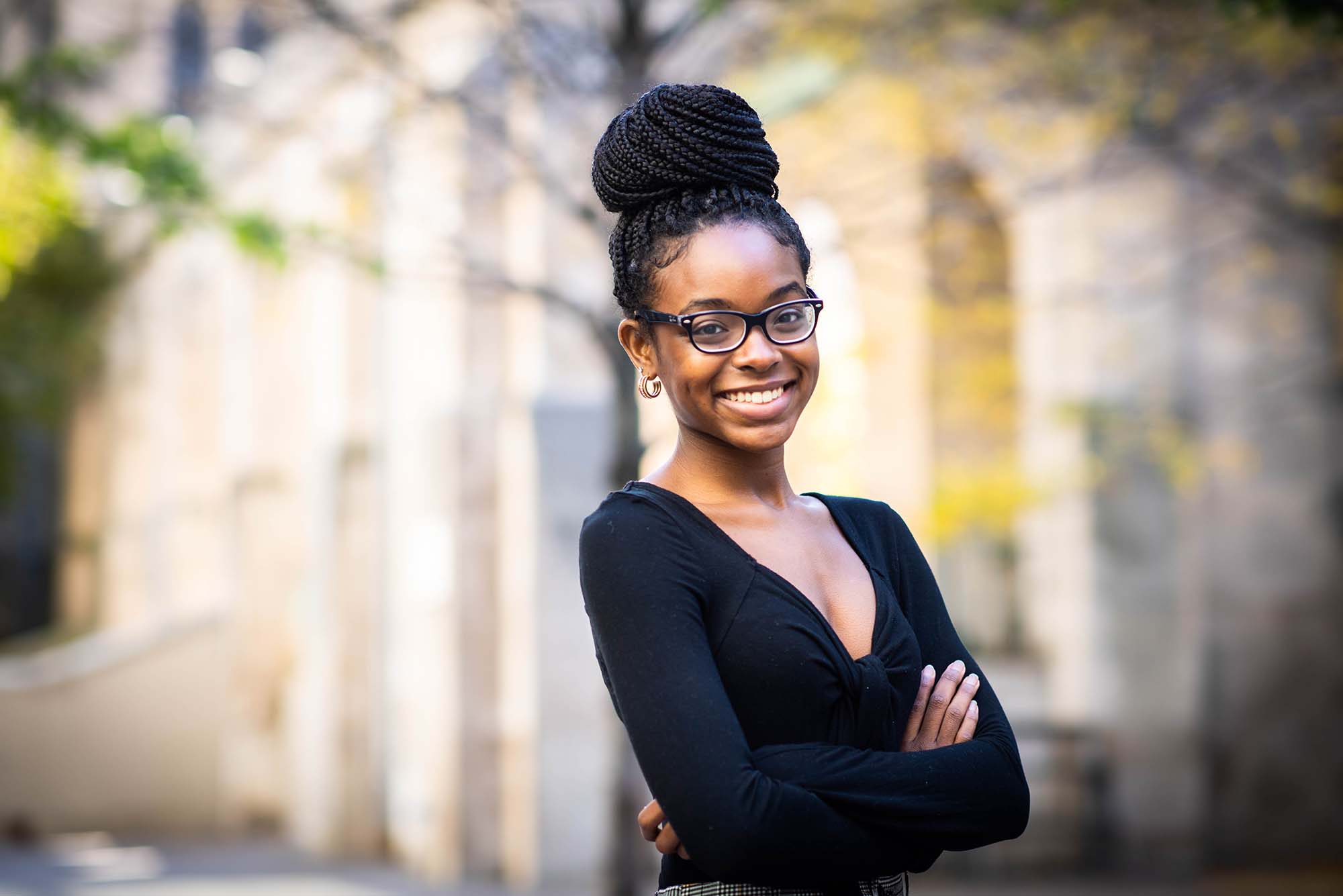 Portrait of Thomas M. Menino Scholar, Alicia Dennery outside on the Boston University Charles River campus.