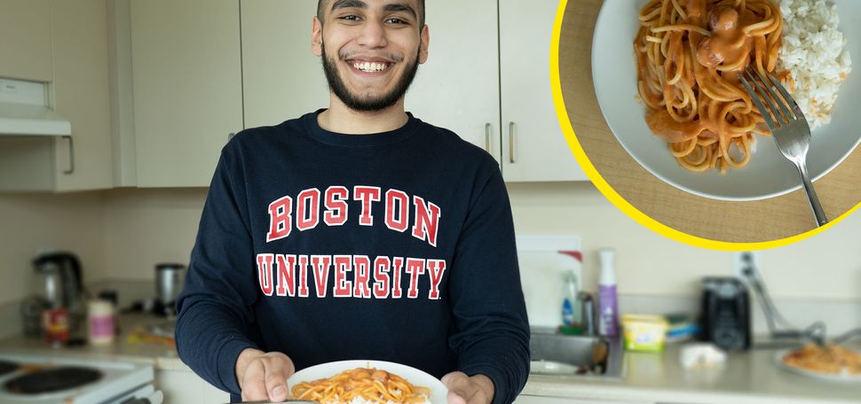Photo of Riaz Butt-Garcia (CAS’22), wearing a blue BU sweatshirt with 'Boston University' written in red, holding a plate of Honduran spaghetti with white rice on the side. He stands in his kitchen, which is blurred, and a closeup photo of the spaghetti is overlaid in the top left with a yellow outline.