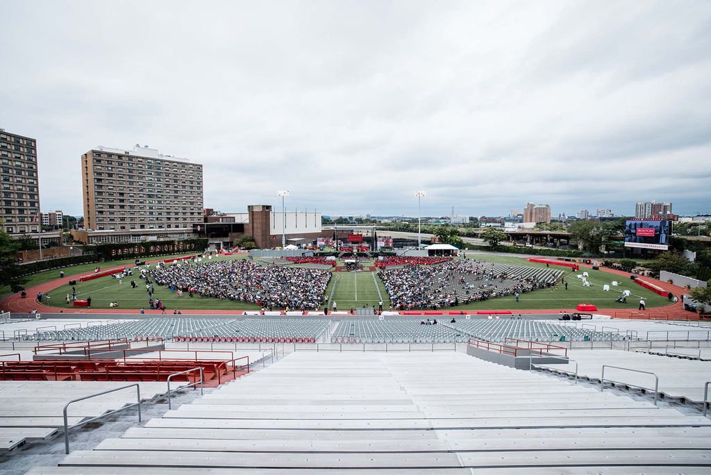 Elevated view of Nickerson Field during Boston University's 147th Commencement taken from the top of the Nickerson Field bleachers.