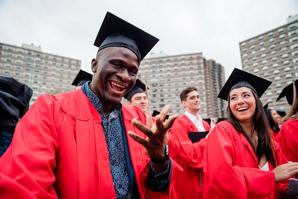 A BU Class of 2020 student poses for a photo during Commencement.