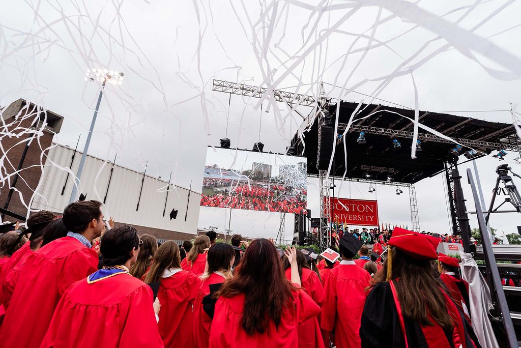 Streamers fly in the air as the BU Class of 2020 is pronounced graduated.