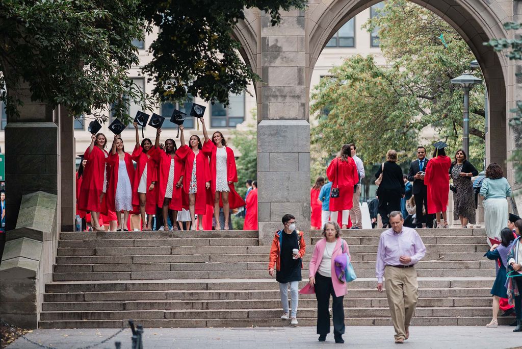 Graduating Students and specators congregate and take photos on Marsh Plaza following Boston University's 147th COmmencement ceremony.