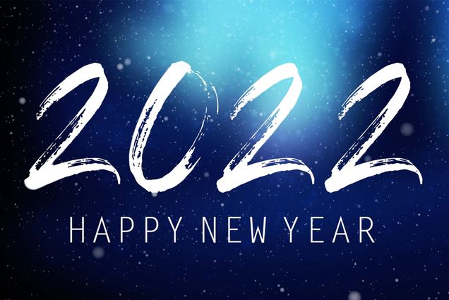 Screenshot from an animation of 2022 being written in a brush like script on a snowy blue background. Below, the words "HAPPY NEW YEAR" are seen.