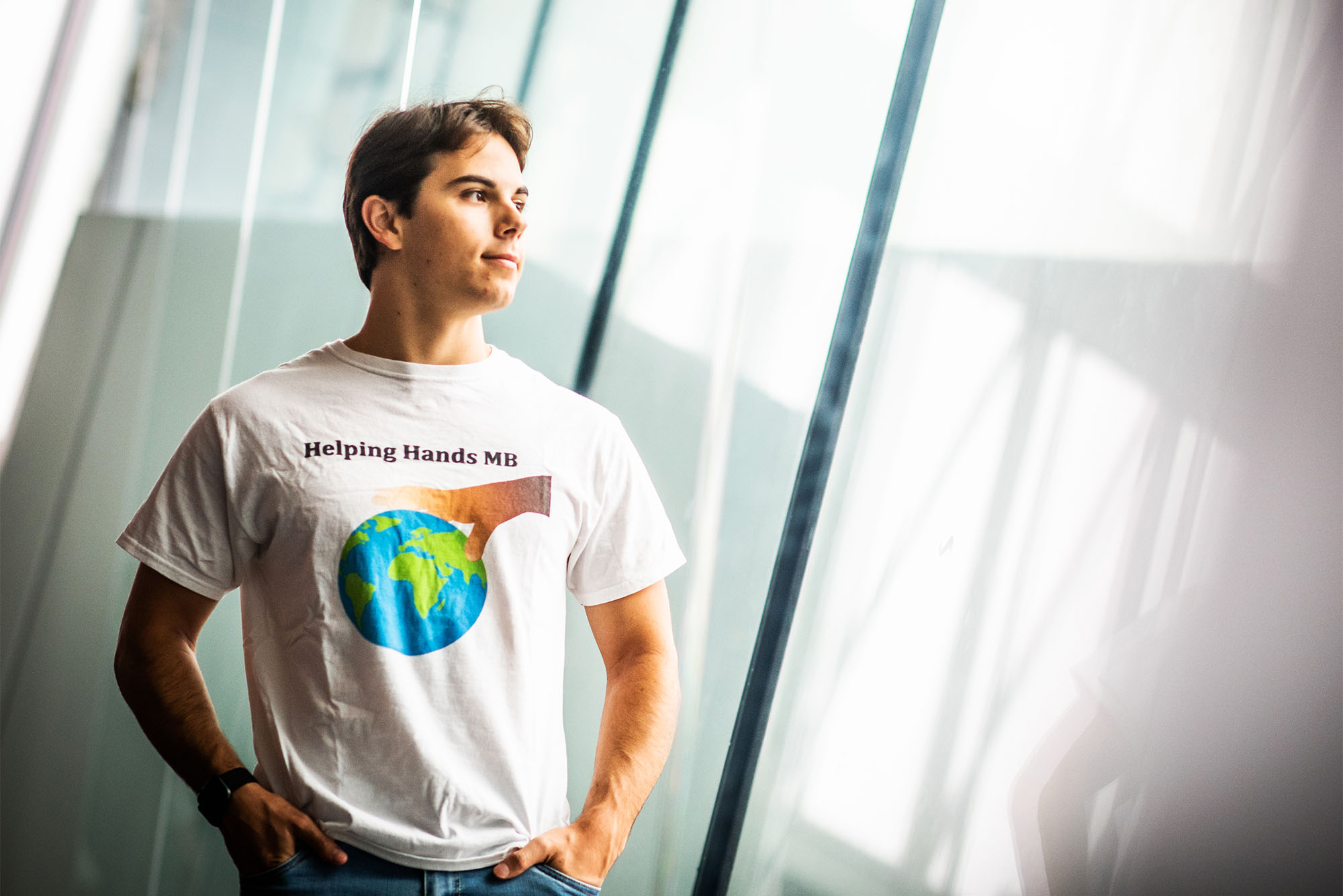 David Tamen poses for a photo on September 6, 2022. He is a Trustee Scholar and became partially deaf when he was 13 and has dedicated most of his efforts since then to helping people with disabilities. To this end, he founded a non-profit with his twin brother called Helping Hands where he oversees the 3D printing of pediatric prosthetics for a clinic in Port-au-Prince, Haiti. . He’s looking forward to leveraging the resources at BU to continue his work to support the disabled poor and doing so much more. Photo by Jackie Ricciardi for Boston University