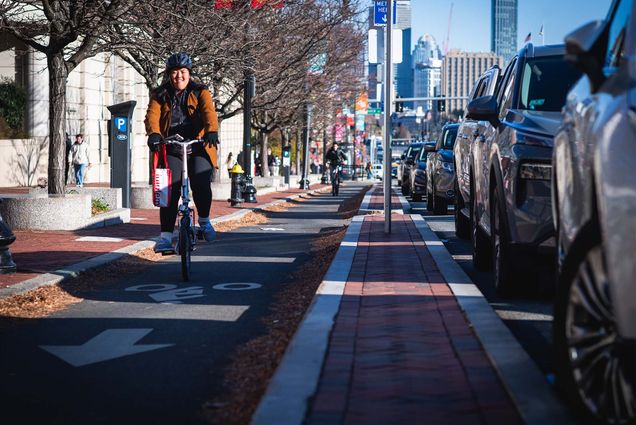 Bikers along Commonwealth Ave on November 22, 2022. Photo by Jackie Ricciardi for Boston University