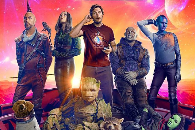 Photo: The cast of Guardians of the Galaxy Vol. 3 stands in front of an orange background in superhero fashion
