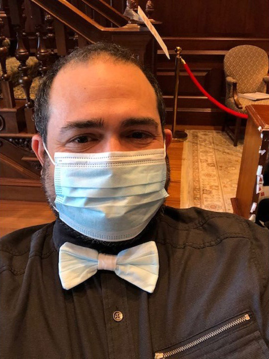Photo of Jesus Nater with a matching mask and bowtie. The bowtie is made from a paper face mask like the one Nater is wearing.