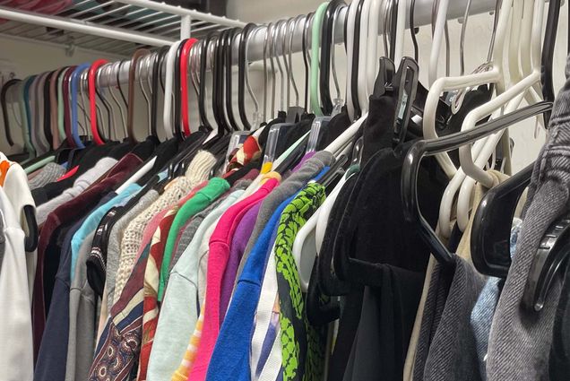 Photo: A closet full of women's clothing on coat hangers