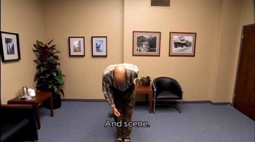 This is a meme of a man bowing down in an office building. The caption on the bottom says "and scene."
