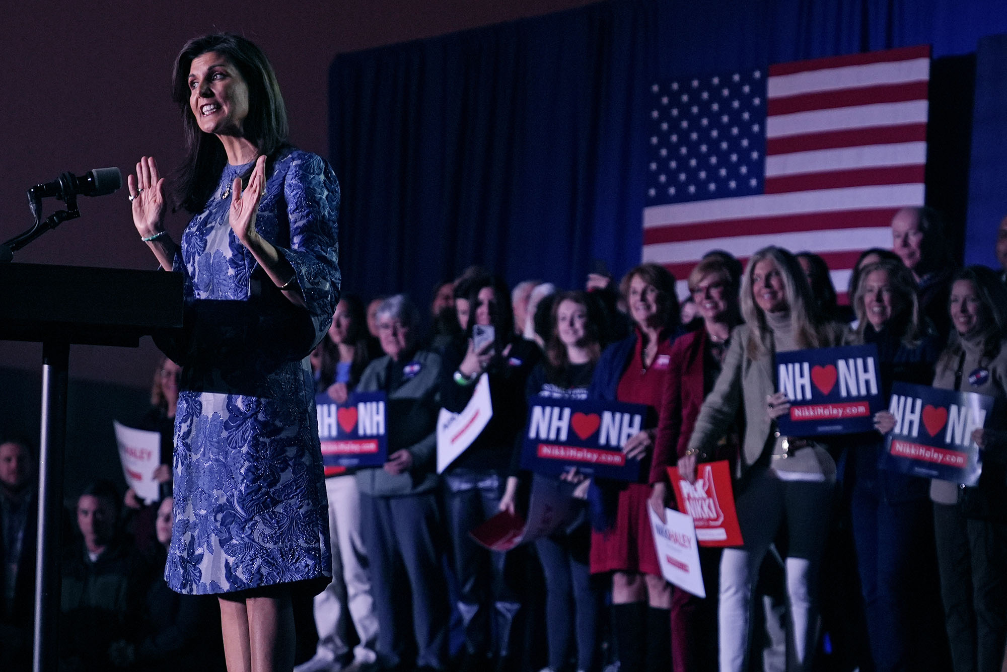 Photo: Republican presidential candidate former UN Ambassador Nikki Haley, a white woman with brown hair, addresses her audience at the New Hampshire primaries.
