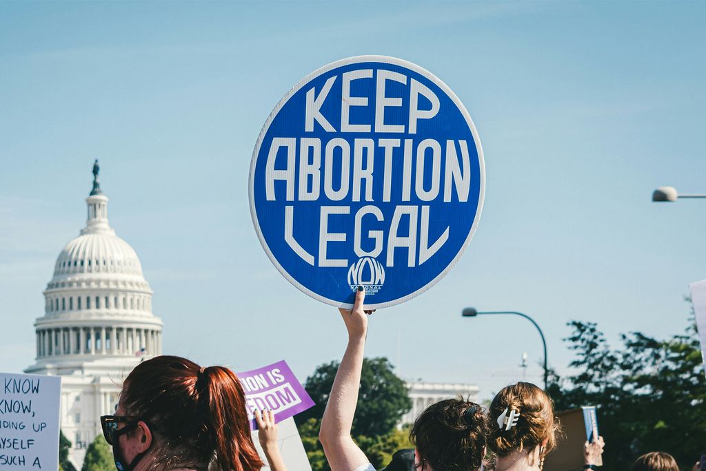 Photo: A protester at the US capital holding a sign that says "Keep Abortion Legal"