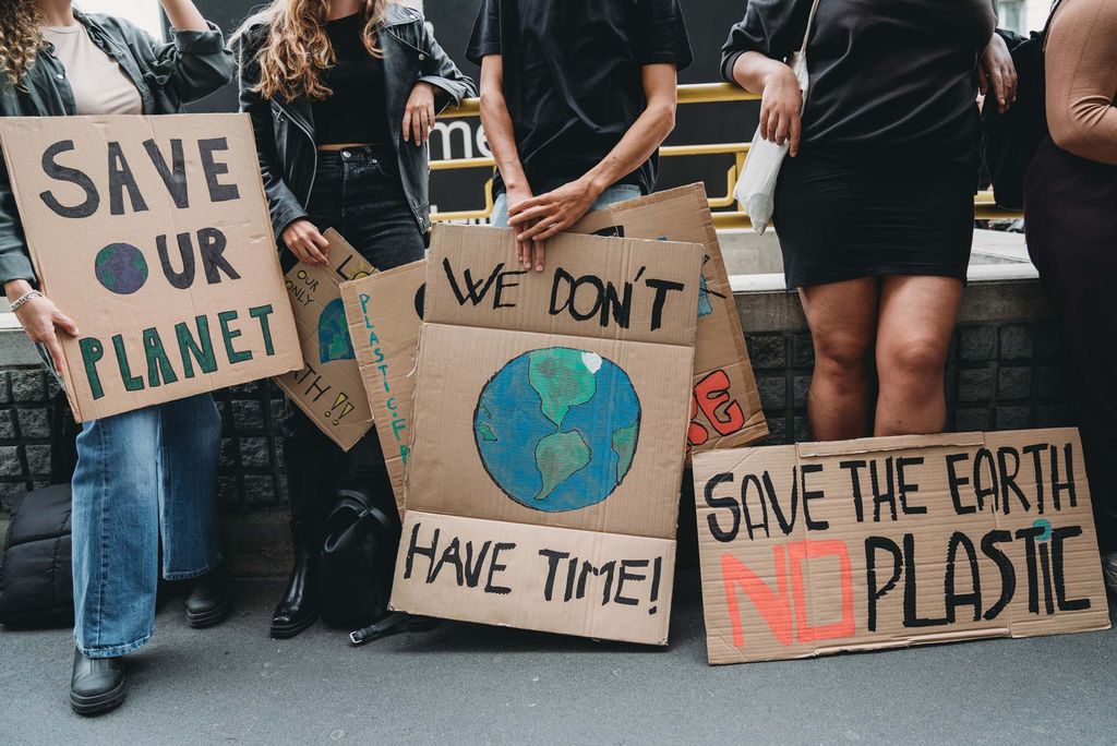 Photo: A group of young climate protestors with signs that read "Save our planet" "No plastic" and "We don't have time!"