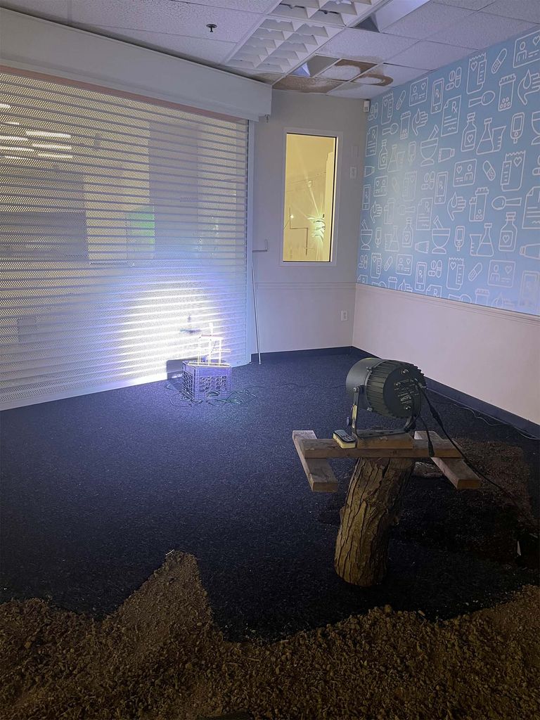 Yolanda He Yang, section of Sand Floor and Two Holes to the Basement and Happenings on the Wall. Piano strings, sand, LED spotlight and motor, glass, projector, wood, plastic sheet, mylar, telephone wires, marble.