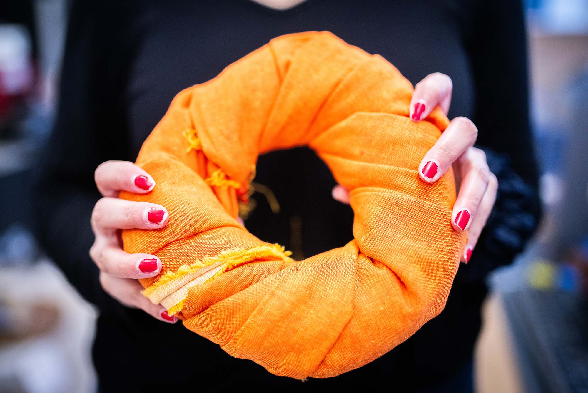 Photo: A picture of a someone holding a ring of fabric