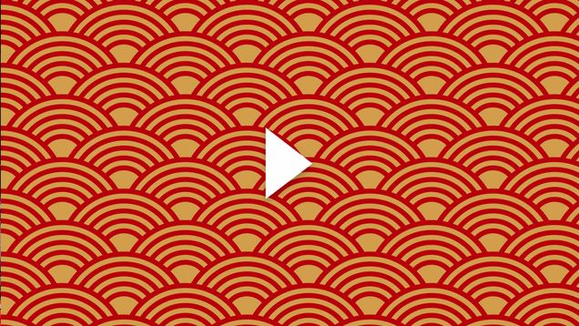Photo: Red and gold vector image of half spirals. There is a white play button overlaid on top of the image
