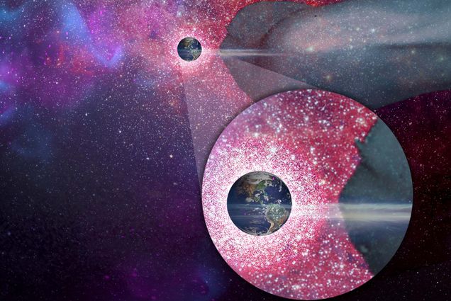 Photo: A picture of Earth surrounded by many stars with a magnified version of the same image in a circle at the bottom right