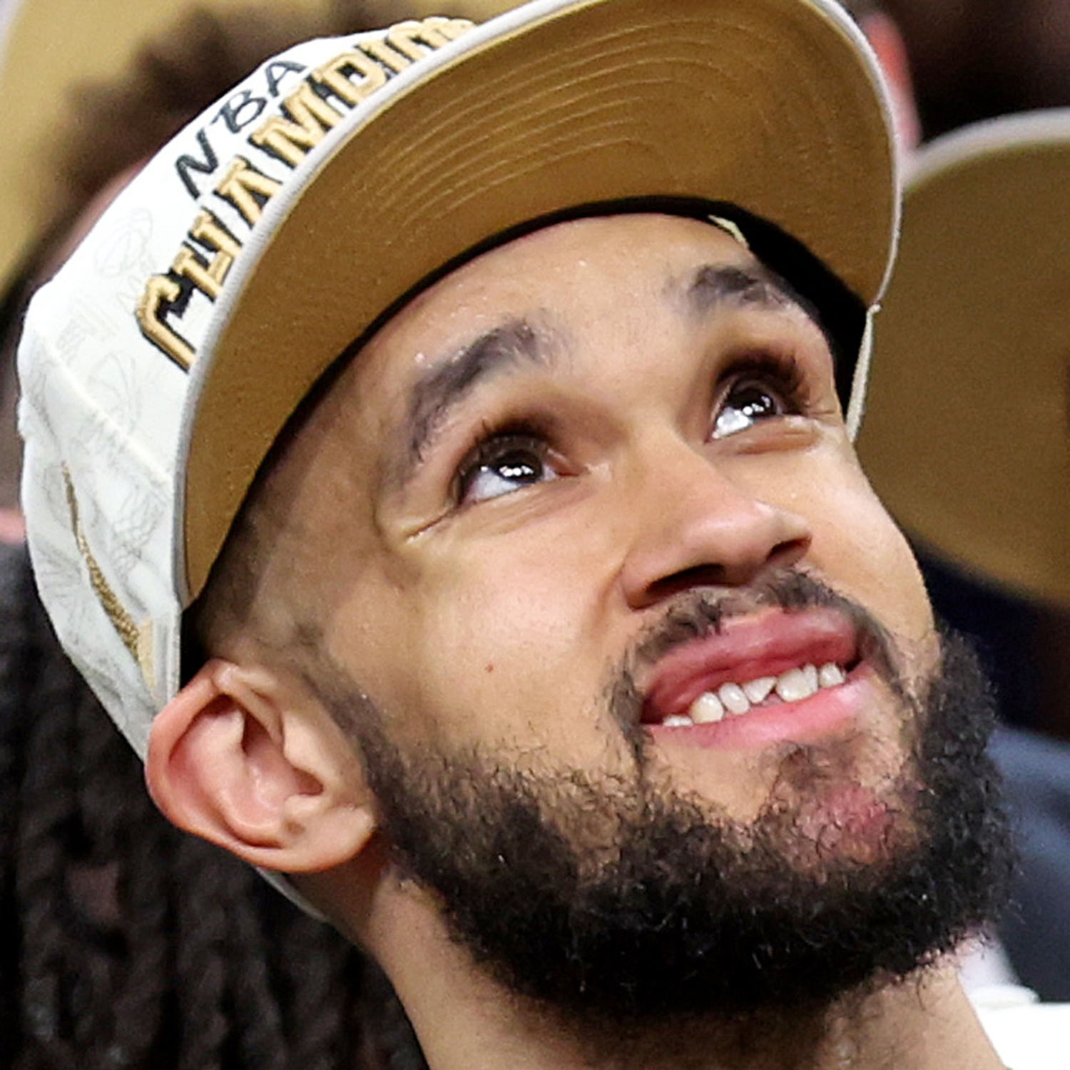 Photo: A picture of Boston Celtics player Derrick White smiling after cracking his tooth during a baseketball game
