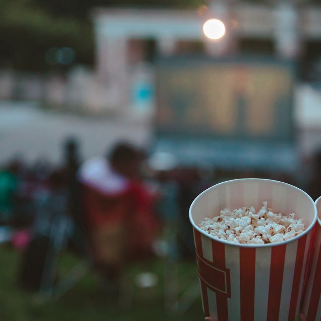 Photo: Two buckets of popcorn up close and to the bottom right hand side of the photo.