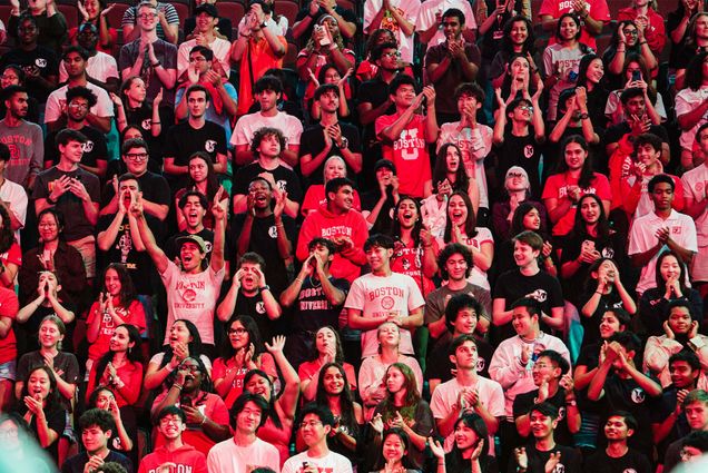 Photo: A sea of college students wearing red Boston University gear at Matriculation 2024.